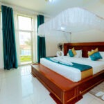 Executive Suite at Classic Hotel Kigali with king bed and sitting area