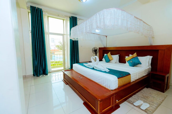 Executive Suite at Classic Hotel Kigali with king bed and sitting area